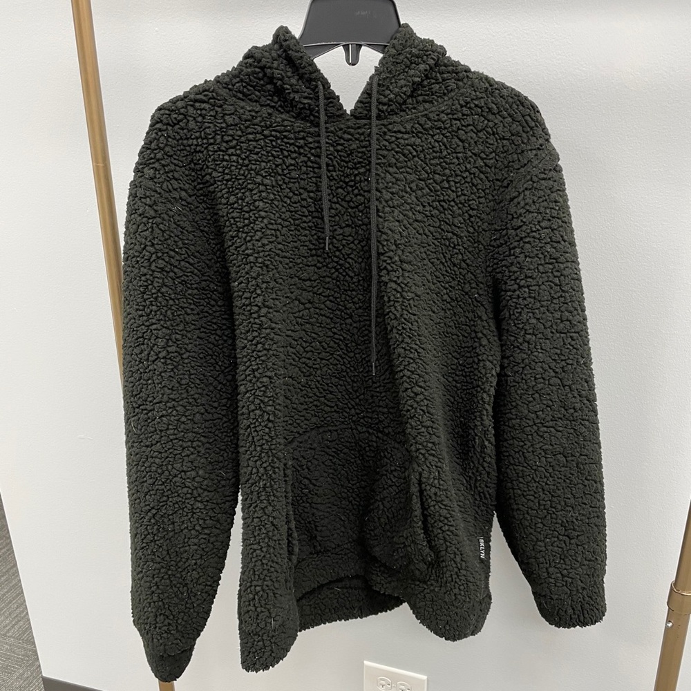Faux shearling pull over hoodie in black